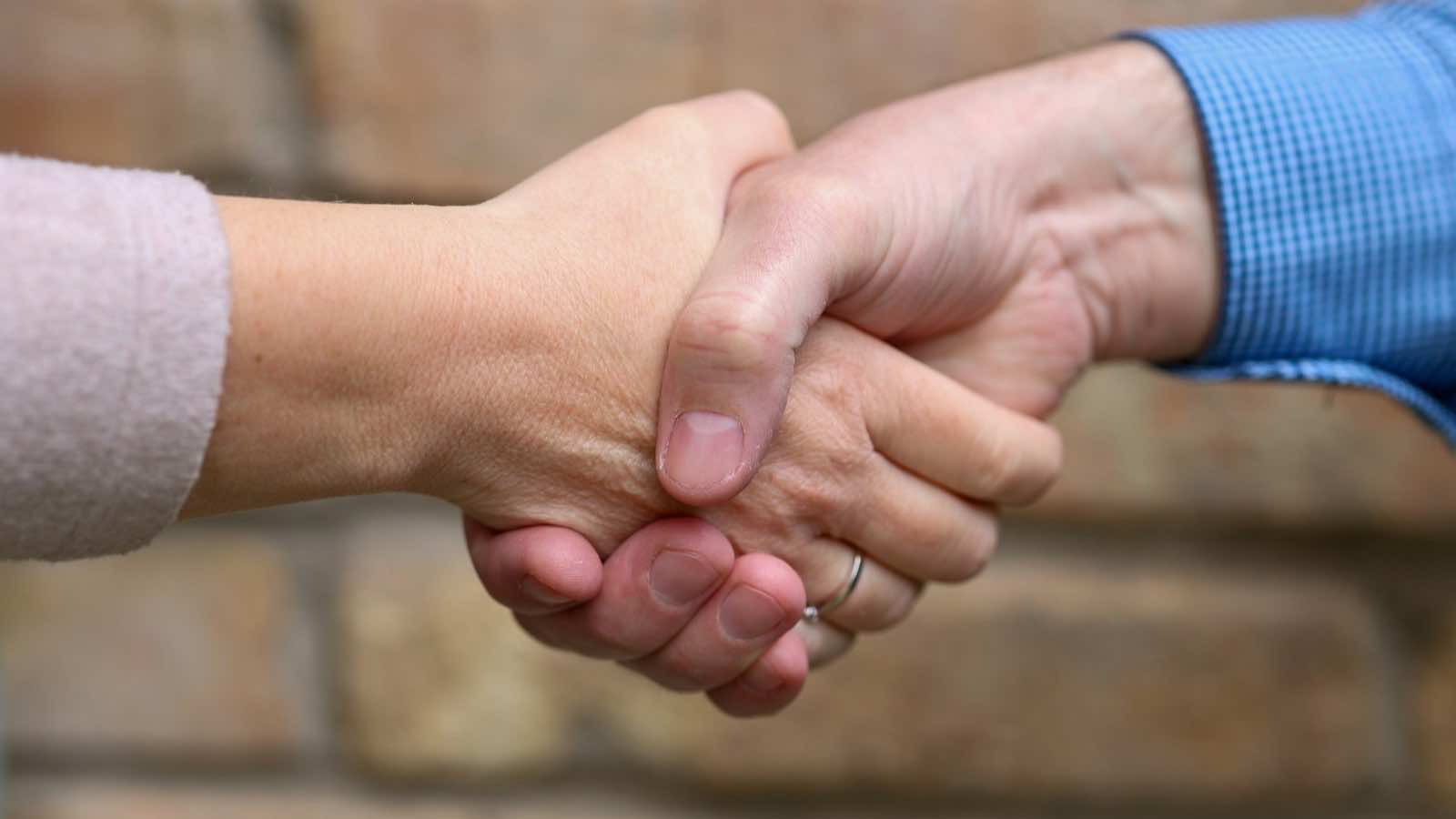 Two people shaking hands
